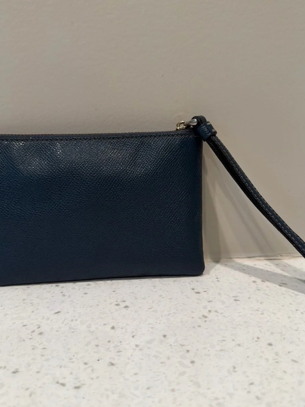 Coach Navy Leather Wristlet with Bronze Hardware